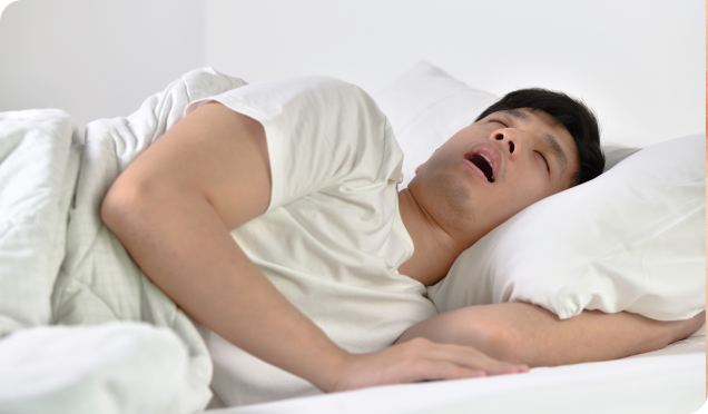 Man Snoring While Sleeping, Affected By Sleep Apnea And Snoring | Living Water Dentistry - Effective Sleep Apnea Treatment In Surrey